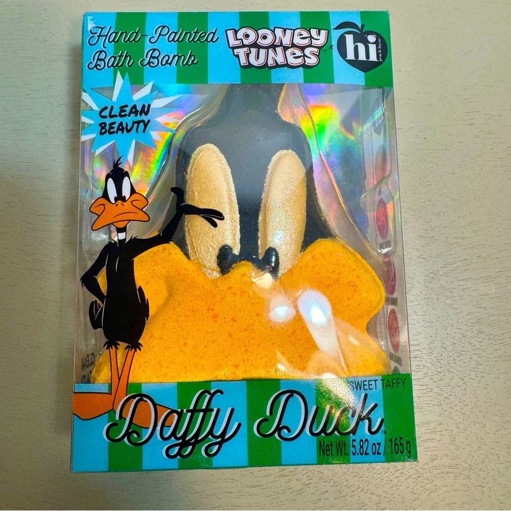NWT. Daffy Duck-shaped bath bomb. The bath bomb is scented like sweet taffy.